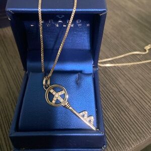 18” sterling chain with sterling silver pendant including 1/4 karat of diamonds